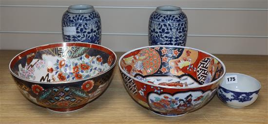 Three Oriental porcelain bowls and a pair of vases